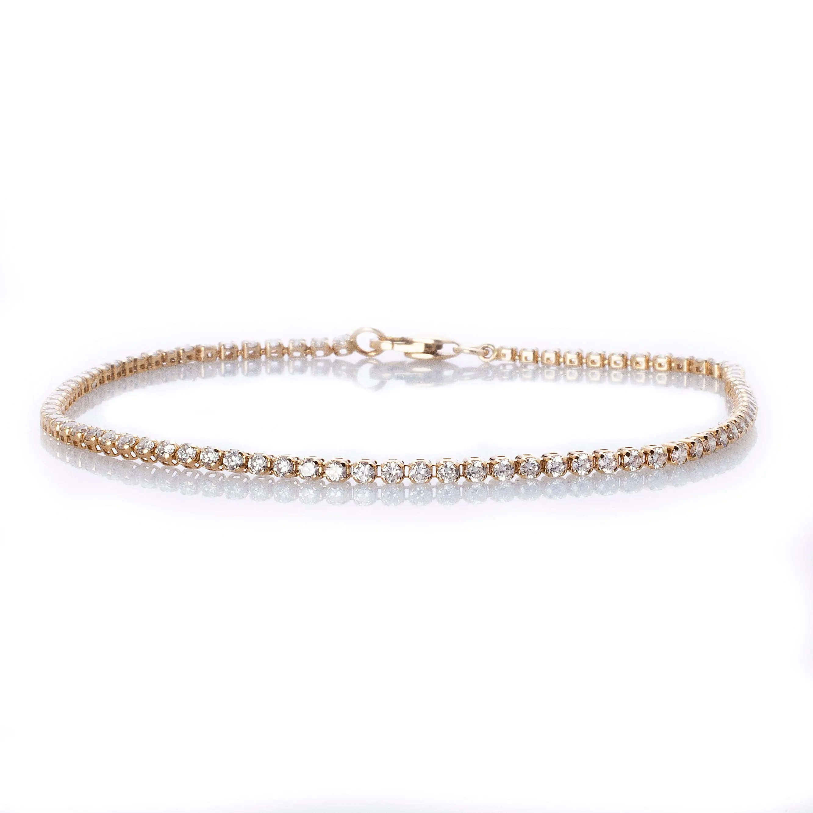 Mini 14K Gold and Diamond Tennis Bracelet Invisible Setting